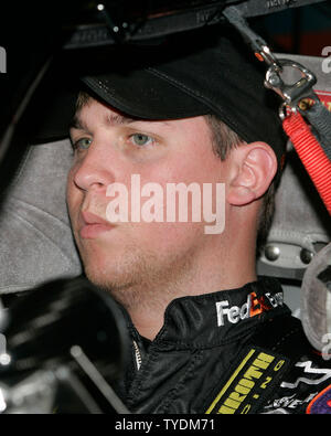 Rookie driver and championship contender Denny Hamlin waits in his car for the Nextel Cup Practice to begin at Homestead-Miami Speedway in Homestead, Florida on November 18, 2006. (UPI Photo/Michael Bush) Stock Photo
