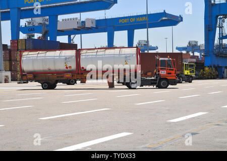 Hazardous Materials shipping, transporting and handling aboard a container ships. Stock Photo