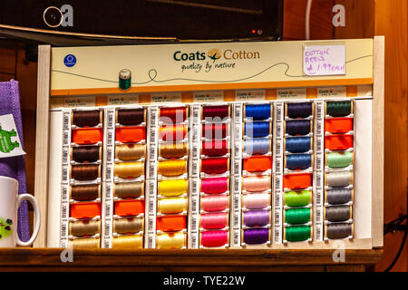 Display of different coloured needlework threads. Stock Photo