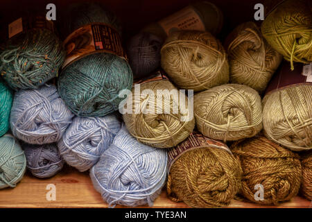 Display of different coloured knitting wools. Stock Photo