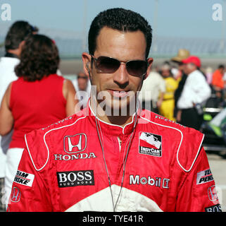 Helio Castroneves walks down pit road during pre-race activities prior to the IRL Firestone Indy 300 at Homestead-Miami Speedway in Homestead, Florida on October 10, 2009.   UPI/Michael Bush Stock Photo