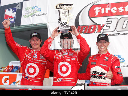 Dario Franchitti (C) celebrates winning the IRL Firestone Indy 300 with Scott Dixon (L) coming in second and Ryan Briscoe finising third at Homestead-Miami Speedway in Homestead, Florida on October 10, 2009.  Franchitti won the IRL championship with his victory.  UPI/Michael Bush Stock Photo