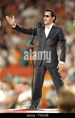 Latin recording artist and minority owner of the Miami Dolphins Marc Anthony performs the National Anthem prior to the game against the New York Jets at Landshark stadium in Miami on October 12, 2009.  The Dolphins defeated the Jets 31-27.  UPI/Michael Bush Stock Photo