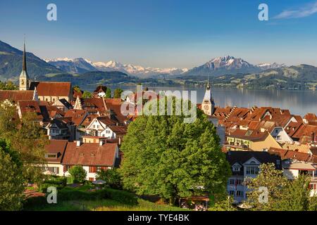 View of the town with Zytturm tower and church, old town with Lake Zug, Pilatus at the back, Zug, Canton Zug, Switzerland Stock Photo