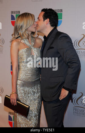 Carlos Calderon and his wife arrive for the 2010 Premio Lo Nuestro award show at American Airlines Arena in Miami, Florida on February  18, 2010. UPI/Martin Fried Stock Photo