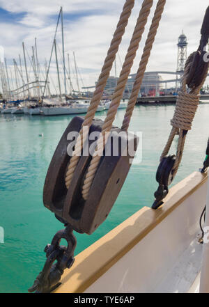 Old wooden block on board the sailing schooner. Stock Photo