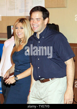 Florida Republican Senatorial candidate Marco Rubio, with his wife Jeanette, casts his vote on Election Day at Open Bible Temple in Miami on November 2, 2010. UPI/Martin Fried Stock Photo