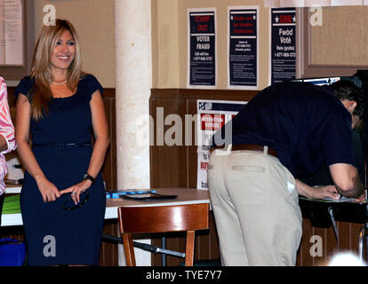 Florida Republican Senatorial candidate Marco Rubio, with his wife Jeanette, casts his vote on Election Day at Open Bible Temple in Miami on November 2, 2010. UPI/Martin Fried Stock Photo