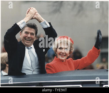 Photograph of The Reagans waving during the Inaugural Parade Stock Photo