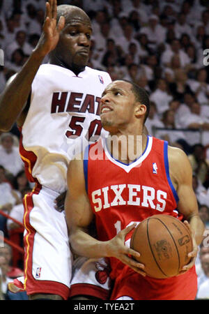 Miami Heat center Joel Anthony (50) blocks Philadelphia 76ers Forward Evan Turner (12) during game 2 of the first round of the Eastern Conference Playoff Series. First half action against the Philadelphia 76ers at the American Airlines Arena, in Miami, Florida April 18th, 2011. .The Miami Heat beat the Philadelphia 76ers 94-73..                                                    UPI/Susan Knowles... Stock Photo