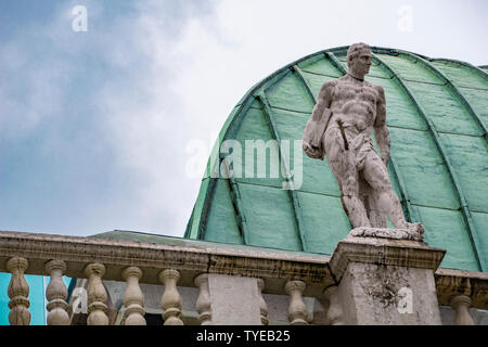 View t statue at Basilica Palladiana with copper roof in Vicenza City in Italy Stock Photo