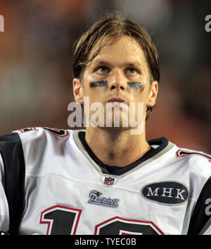 New England Patriots quarterback Tom Brady looks at the board during 2nd  half action, between the Miami Dolphins, and the New England Patriots  September 12, 2011 at Sun Life Stadium in Miami, Florida.The New England  Patriots beat the Miami