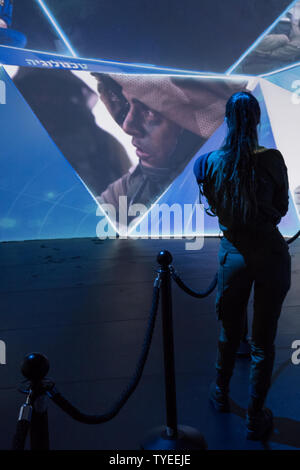 Jerusalem, Israel. 26th June, 2019. 'Our IDF' exhibition opens at the First Station in Jerusalem featuring armored combat vehicles, an F16 fighter jet, an audio video presentation and combat simulators based on virtual reality. The conscription based IDF, considered in Israel the 'people's army', opens its doors to the public free of charge fulfilling its role in creating a close bond with the public. Credit: Nir Alon/Alamy Live News. Stock Photo