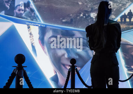 Jerusalem, Israel. 26th June, 2019. 'Our IDF' exhibition opens at the First Station in Jerusalem featuring armored combat vehicles, an F16 fighter jet, an audio video presentation and combat simulators based on virtual reality. The conscription based IDF, considered in Israel the 'people's army', opens its doors to the public free of charge fulfilling its role in creating a close bond with the public. Credit: Nir Alon/Alamy Live News. Stock Photo