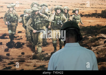 Jerusalem, Israel. 26th June, 2019. 'Our IDF' exhibition opens at the First Station in Jerusalem featuring armored combat vehicles, an F16 fighter jet, an audio video presentation and combat simulators based on virtual reality. The conscription based IDF, considered in Israel the 'people's army', opens its doors to the public free of charge fulfilling its role in creating a close bond with the public. Credit: Nir Alon/Alamy Live News. Stock Photo