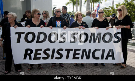 Anti-Castro protesters gather in Jose Marti park in Little Havana, Miami, Florida, December 20, 2014.   The protesters came together to show opposition to President Obama's plan to establish relationships between the United States and Cuba. UPI / Gary I Rothstein Stock Photo