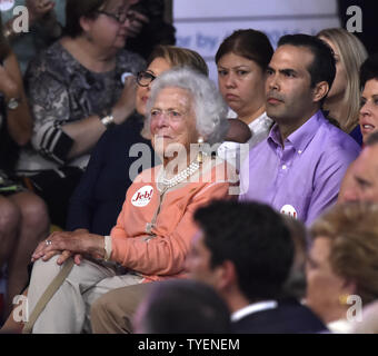 Former First Lady Barbara Bush and former Governor Jeb Bush's son George wait for Jeb Bush to announces his candidacy for the President of The United States during a rally at the Theodore Gibson Health Center of Miami-Dade College, Kendall Campus in Miami, Florida,  June 15, 2015. Photo by Gary I Rothstein/UPI. .. Stock Photo