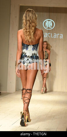 A runway model is seen presenting a swimsuit creation by Aguaclara      fashion designer during the Funkshion Miami Swim Week at the Funkshion tent, Miami Beach, Florida, July 15, 2016. Photo by Gary I Rothstein/UPI Stock Photo