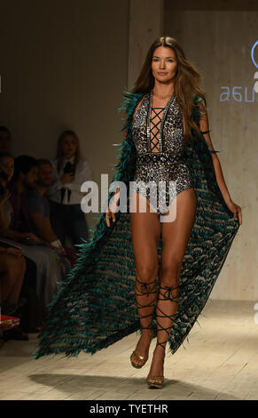 A runway model is seen presenting a swimsuit creation by Aguaclara      fashion designer during the Funkshion Miami Swim Week at the Funkshion tent, Miami Beach, Florida, July 15, 2016. Photo by Gary I Rothstein/UPI Stock Photo