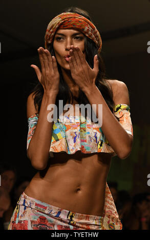 A runway model is seen presenting a swimsuit creation by Lume fashion designer during the Funkshion Miami Swim Week at the Funkshion tent, Miami Beach, Florida, July 15, 2016. Photo by Gary I Rothstein/UPI Stock Photo