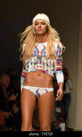 A runway model is seen presenting a swimsuit creation by Lume fashion designer during the Funkshion Miami Swim Week at the Funkshion tent, Miami Beach, Florida, July 15, 2016. Photo by Gary I Rothstein/UPI Stock Photo