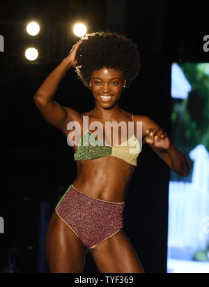 A model walks the runway during the 2018 Sports Illustrated