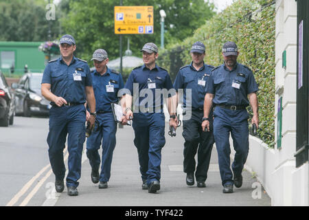 Wimbledon, London. UK . 26th June 2019.  Police conduct security checks outside the grounds of  (AELTC) All England Lawn Tennis Club  as this year's tournament  which starts on 1 July will see increased security measures. Credit: amer ghazzal/Alamy Live News Stock Photo