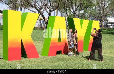 Rasta fans pose for a photo at the KAYA music fest at Bayfront park in ...