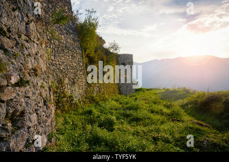 Medieval stone wall at the sunset. Castle on Kozlov Rob in Tolmin, Slovenia Stock Photo