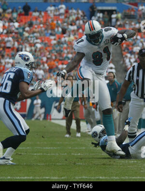 Miami Dolphins tightend Randy McMichael gains yardages against the  Tenneessee Titans December 24, at Dolphins Stadium in Miami Fl. The Miami  Dolphins beat the Tennessee Titans 24-10. (UPI PHOTO/Susan Knowles Stock  Photo 