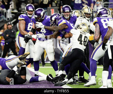 Minnesota Vikings running back Latavius Murray (25) runs the ball during  the first half of an NFL football game against the Detroit Lions in  Detroit, Michigan USA, on Thursday, November 23, 2017. (