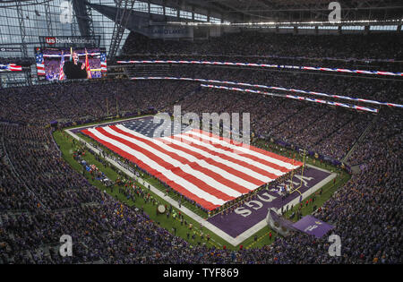 US flag is seen during the national anthem before the the NFC Divisional round playoff game between New Orleans Saints and Minnesota Vikings at U.S. Bank Stadium in Minneapolis on January 14, 2018. Photo by Kamil Krzaczynski/UPI Stock Photo