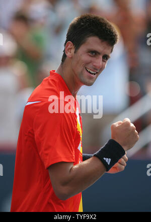 Novak Djokovic of Serbia celebrates victory at the end of his final match against Roger Federer of Switzerland in the Rogers Cup ATP Masters Series at Uniprix Stadium in Montreal on August 12, 2007.  Djokovic defeated the top-ranked Federer 7-6(2), 2-6, 7-6(2) to lead the U.S. Open Series of tournaments. (UPI Photo/Grace Chiu). Stock Photo