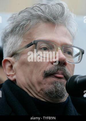 Leader of the radical National Bolshevik Party Eduard Limonov speaks during a rally in Moscow on December 16, 2006. Russian opposition parties rallied on Saturday to protest recent electoral law changes and to challenge President Vladimir Putin, but their demonstration in central Moscow was dwarfed by riot police. (UPI Photo/Anatoli Zhdanov) Stock Photo