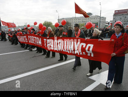 Russian communist party members and young supporters march during a traditional demonstration on May Day Spring and Labor holiday in central Moscow on May 1, 2007. (UPI Photo/Anatoli Zhdanov) Stock Photo
