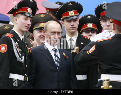 Military cadets pose for a picture with Russian President Putin during a military parade on the Red Square in Moscow on May 9, 2007. Russia is celebrating the 62nd anniversary of the World War Two victory over Nazi Germany. (UPI Photo/Anatoli Zhdanov) Stock Photo