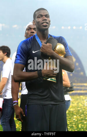 Paul Pogba of France celebrates with the trophy following the 2018 FIFA World Cup final match at Luzhniki Stadium in Moscow, Russia on July 15, 2018. France beat Croatia 4-2. Photo by Chris Brunskill/UPI Stock Photo