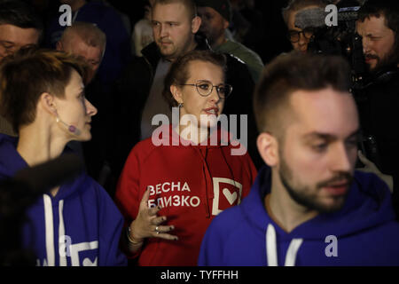 Presidential hopeful Ksenia Sobchak talks to the media at her last campaign event in Moscow on March 15, 2018 two days ahead of presidential elections in Russia. Her hoodie  reads in Russian 'the spring is near by'. Photo by Yuri Gripas/UPI Stock Photo