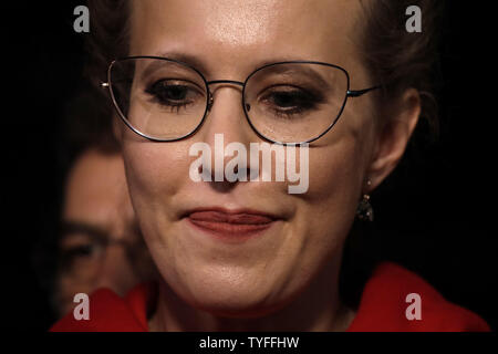 Presidential hopeful Ksenia Sobchak talks to the media at her last campaign event in Moscow on March 15, 2018 two days ahead of presidential elections in Russia. Her hoodie  reads in Russian 'the spring is near by'. Photo by Yuri Gripas/UPI Stock Photo