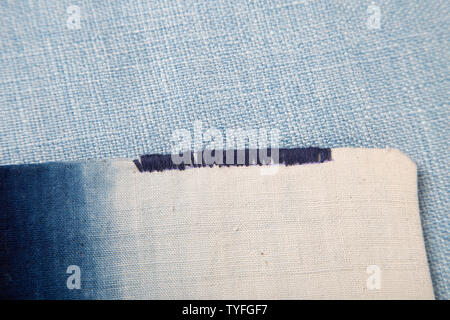 Non-legacy blue dyeing handmade embroidery small tea mat, tea mat, coaster Stock Photo
