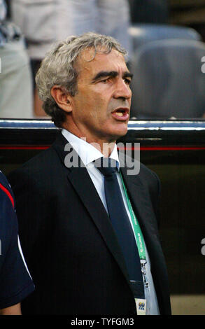 French coach Raymond Domenech watches his team beat Portugal during World Cup soccer in Munich, Germany on July 5, 2006. France defeated Portugal 1-0.   (UPI Photo/Arthur Thill) Stock Photo
