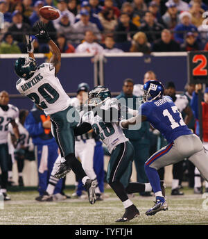 Philadelphia Eagles Brian Dawkins makes an interception over New