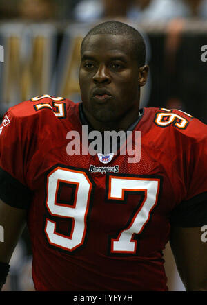 Tampa Bay Buccaneers' Simeon Rice (97) removes his gloves with 30 seconds  left in the fourth quarter in the Buc's 37-20 loss against the Carolina  Panthers at Raymond James Stadium in Tampa