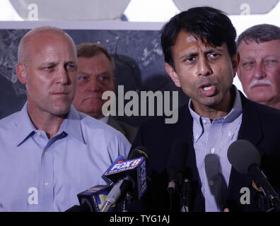 Louisiana Gov. Bobby Jindal, right, discusses the massive Gulf of Mexico oil leak May 4, 2010, as New Orleans Mayor Mitch Landrieu, left, listens. Officials met at the Rigolets pass, which connects Lake Pontchartrain with coastal waters and the Gulf, to talk about how the lake is being protected with booms from the spreading oil slick.    UPI/A.J. Sisco Stock Photo