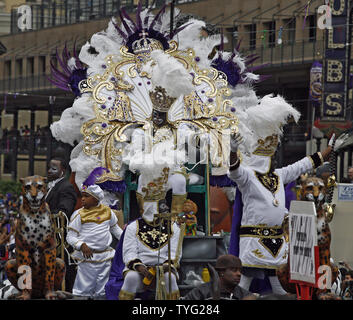 Members of the Zulu Social Aid and Pleasure Club parade down St. Charles Avenue in New Orleans on Mardi Gras, March 8, 2011. Zulu, a traditionally African-American Carnival organization has been parading for over a hundred years.  (UPI/A.J. Sisco) Stock Photo