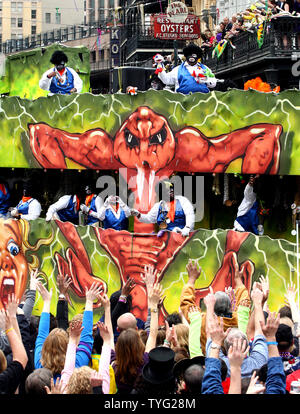 Hands reach up for beads and trinkets as members of the Zulu Social Aid and Pleasure Club parade down St. Charles Avenue in New Orleans on Mardi Gras, March 8, 2011. Zulu, a traditionally African-American Carnival organization, has been parading for over a hundred years.  (UPI/A.J. Sisco) Stock Photo