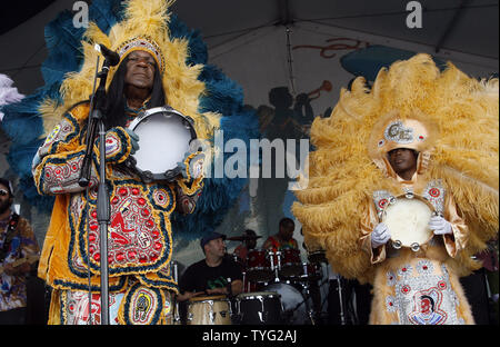 Big Chief Monk Boudreaux, left, leads the Golden Eagles Mardi Gras Indians in traditional songs and chants at the New Orleans Jazz and Heritage Festival in New Orleans, May 1, 2011. UPI/A.J. Sisco. Stock Photo