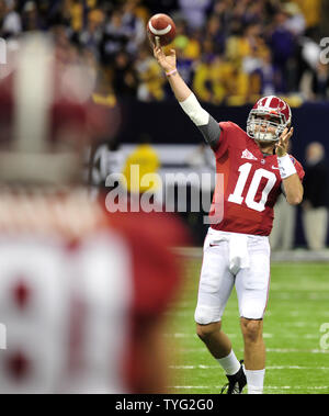 Alabama Crimson Tide quarterback AJ McCarron (10) warms up before the BCS College Football Championship with LSU at the Mercedes-Benz Superdome in New Orleans, Louisiana, on January 9, 2012.    UPI/David Tulis Stock Photo