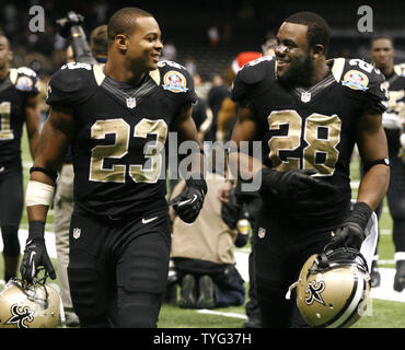 New Orleans Saints running backs Mark Ingram (22) and Adrian Peterson ...