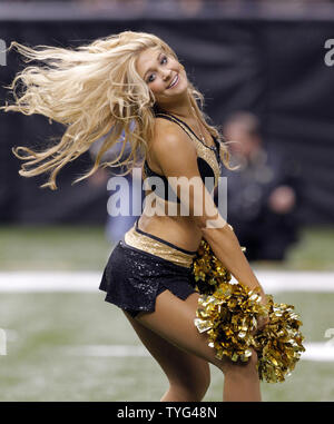 New Orleans Saints cheerleader Jesse Hernandez, a member of the  Saintsations, dances in the first half of an NFL football game against the  Tampa Bay Buccaneers in New Orleans, Sunday, Sept. 9